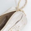 Immagine di RBJ RENATO BALESTRA- Tracolla oro con tasca trapuntata, borchie e strass e chiusura a girello