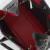 Immagine di GIANMARCO VENTURI - Borsa nera con fodera interna rossa, due manici con pennacchio a frange e pratiche tasche interne