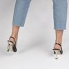 Immagine di MISS GLOBO - DÉCOLLETÉ SLINGBACK NERA CON MORSETTI E TACCO ORO 9CM