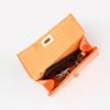 Immagine di MISS GLOBO - Pochette arancione in vernice con patta e chiusura a girello