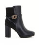 Immagine di LAURA BIAGIOTTI - Tronchetto nero a calza con dettagli oro e zip laterale, tacco 8cm