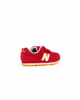 Immagine di NEW BALANCE - Sneakers da bambino rossa e gialla con dettagli bianchi e strappo, numerata 28/35