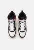 Immagine di PUMA REBOUND JOY JR - Sneakers alta bianca e nera con dettagli rossi e lacci, numerata 36/39