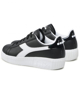 Immagine di DIADORA GAME STEP GS - Sneakers nera e bianca con dettaglio posteriore nero metallizzato e suola alta, numerata 36/39