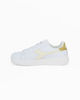 Immagine di DIADORA GAME STEP GS - Sneakers bianca e gialla con dettaglio posteriore oro metallizzato e suola alta, numerata 36/39