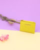 Immagine di Portafoglio donna giallo, con effetto intreccio, con portaspicci e porta carte - Marina Galanti