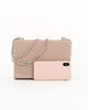 Immagine di MISS GLOBO - Pochette nude in vernice con fiocco e bordino in strass sulla patta