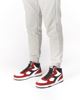 Immagine di DIADORA HIGH SL - Sneakers alta bianca e rossa con tomaia in VERA PELLE e dettagli neri