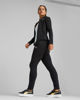 Immagine di PUMA - Tuta completa da donna nera con zip frontale e pantalone nero con elastico in vita
