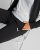 Immagine di PUMA - Tuta completa da donna nera con zip frontale e pantalone nero con elastico in vita