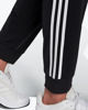 Immagine di ADIDAS - PANTALONI DA ALLENAMENTO PRIMEGREEN ESSENTIALS WARM-UP TAPERED 3-STRIPES - H46105