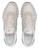 Immagine di NEW BALANCE - Sneakers da uomo grigia con dettagli verdi e soletta in memory foam
