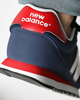 Immagine di NEW BALANCE - Sneakers da uomo blu con dettagli rossi e soletta in memory foam