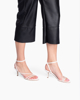 Immagine di MISS GLOBO - Sandalo bianco con cinturino diagonale, tacco 7CM