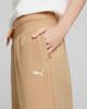 Immagine di PUMA - Pantalone da donna beige a palazzo con elastico in vita e lacci