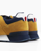 Immagine di COLMAR - Sneakers ocra in VERA PELLE con dettagli blu, modello TRAVIS AUTHENTIC