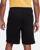 Immagine di NIKE - Pantalone corto da uomo nero con logo bianco e giallo