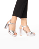 Immagine di MISS GLOBO - Sandalo argento con cinturino alla caviglia, tacco 9CM