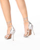 Immagine di MISS GLOBO - Sandalo argento lace-up multifasce con nodo, tacco 9,5CM