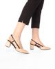 Immagine di LAURA BIAGIOTTI - Décolleté slingback beige con ciondolo logo sulla fibbia, tacco 6CM