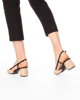 Immagine di LAURA BIAGIOTTI - Décolleté slingback beige con ciondolo logo sulla fibbia, tacco 6CM