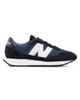 Immagine di NEW BALANCE - Sneakers da uomo blu e bianca con dettagli scamosciati - 237