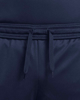 Immagine di NIKE - Pantaloncini corti da bambino blu scuro in tessuto traspirante con dettagli bianchi