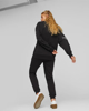 Immagine di PUMA - Pantalone da donna nero con Stampa logo laterale