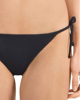 Immagine di PUMA - Slip bikini nero con allacciatura laterale