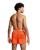 Immagine di PUMA - Costume da bagno pantaloncino corto arancione con elastico in vita e logo bianco