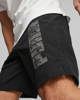 Immagine di PUMA - Pantaloni corti da uomo neri con logo grigio e lacci