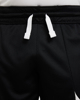 Immagine di NIKE - Pantaloncino corto da bambino nero e bianco in tessuto traspirante