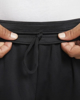 Immagine di NIKE - Pantaloni corti loose fit da uomo neri in tessuto traspirante con logo bianco