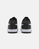 Immagine di PUMA - Sneakers da uomo nera e bianca con dettagli oro - CAVEN 2.0