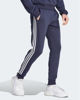 Immagine di ADIDAS - PANTALONI ESSENTIALS FLEECE 3-STRIPES TAPERED CUFF - IJ6493