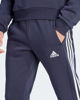 Immagine di ADIDAS - PANTALONI ESSENTIALS FLEECE 3-STRIPES TAPERED CUFF - IJ6493
