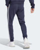 Immagine di ADIDAS - PANTALONI ESSENTIALS FLEECE 3-STRIPES TAPERED CUFF - IJ6493