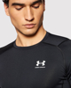 Immagine di UNDER ARMOR - T shirt da allenamento nera aderente in tessuto traspirante con