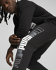 Immagine di PUMA - Pantalone tuta da uomo nero con stampa logo sulla gamba