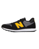 Immagine di NEW BALANCE - Sneaker da uomo nera con logo giallo - 500