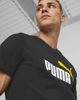 Immagine di PUMA - T shirt da uomo nera con logo bianco e giallo