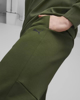 Immagine di PUMA - Pantalone tuta da uomo verde scuro con logo nero
