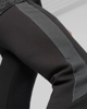 Immagine di PUMA - Pantaloni tuta da uomo neri slim fit in tessuto traspirante