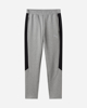 Immagine di PUMA - Pantaloni tuta da uomo grigi e neri slim fit in tessuto traspirante