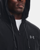 Immagine di UNDER ARMOR - Giacca da uomo nera idroprepellente antivento con zip frontale e cappuccio