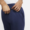 Immagine di NIKE - Pantalone tuta da uomo blu con elastico alla caviglia