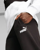 Immagine di PUMA - Pantalone tuta da uomo nero con logo bianco