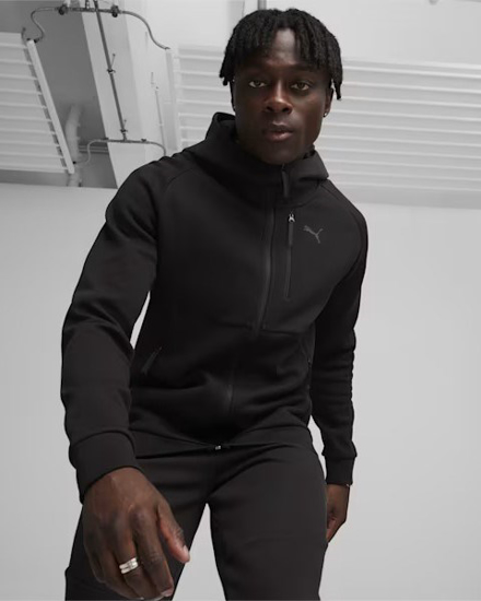 Immagine di PUMA - Felpa nera da uomo in tessuto traspirante con zip frontale e cappuccio