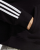 Immagine di ADIDAS - Felpa nera da donna con zip frontale e cappuccio - IK8388