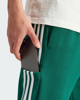 Immagine di ADIDAS 3S WV TC PT - Pantalone verde con bande laterali bianche - IS1392